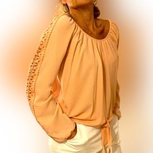 American rag soft peach pheasant top with lace down sleeves,tie at waist size M